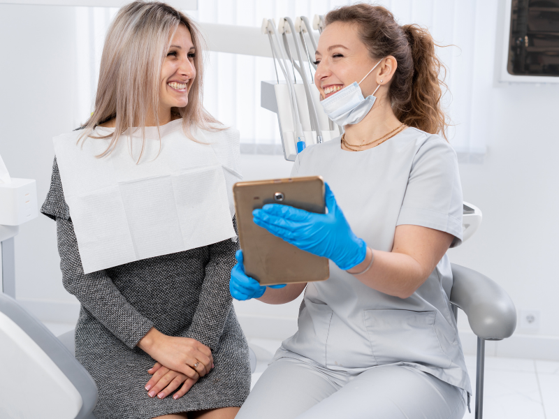 image of assistant educating and communicating with a patient